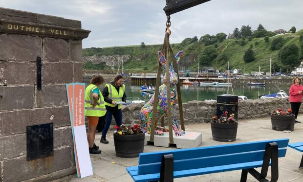 A sculpture titled Hare Styles arrives at Stonehaven with project manager Teresa Bremner, right, and Fiona Fernie both of Clan.