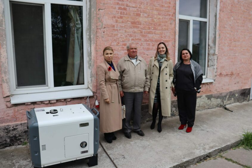 Left to right with generator: Karina Derun, Head of Notary Chamberof Ukraine in Kyiv Region), Khomenko Hryhoriy, Head Engineer at the home, Halyna Parusova (who arranged the purchase and delivery of the generator) and Yakymenko Lesiia private notary in Tarashcha 