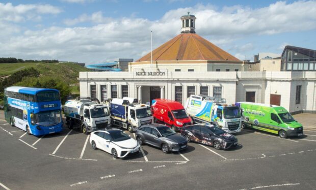 Hydrogen-powered vehicles outside Aberdeen Beach Ballroom.