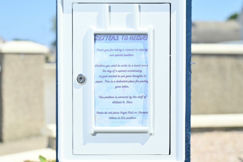 The notice on a new, white postbox to Heaven in Buckie.