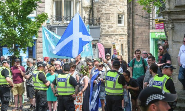 Hundreds turn out in protest of anti-immigration rally in Elgin, as well as a strong police presence.
Image: Jason Hedges/DC Thomson