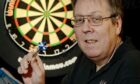 Jim MacNeil with a darts feather.