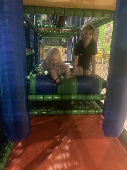 Children playing in the softplay area.