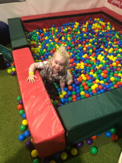 Young girl in the softplay section at the Aberdeen trampoline park.