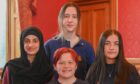 The first four female recipients of the Boys' Brigade President's Badge. (L-R) Hafsa Ahmad, 16, Summer Williamson, 16, Danielle Stewart, 15, and (front) Ebby McIntosh,16. Image: Kenny Elrick/DC Thomson