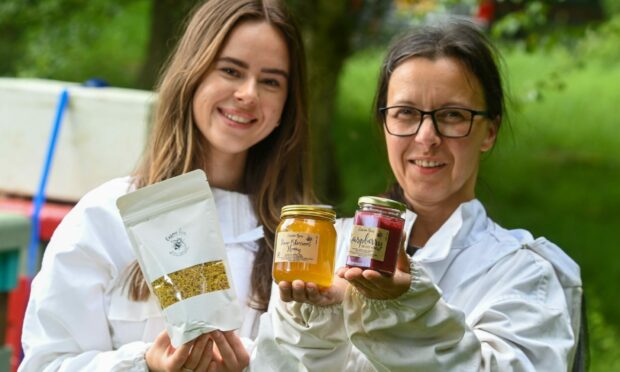 Kaya Malinowska and her mum Anna are the bee's knees after launching Carnie Bees, their family business producing honey, candles and pollen you can sprinkle on your cereal.Image: Kenny Elrick/DC Thomson