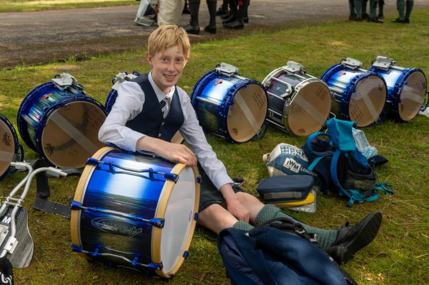 Tom Newton from the George Hertion pipe band smiles for pictures at the European Pipe Band Championships in Aberdeen. 