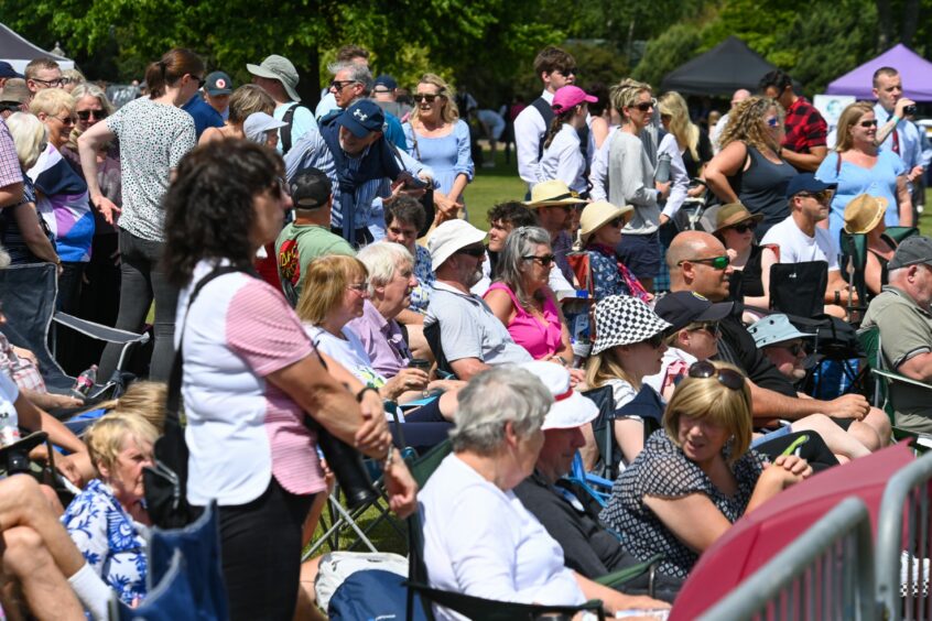 Crowds watching performances.