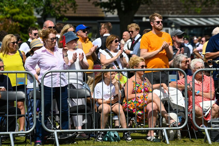 Visitors enjoying the music.