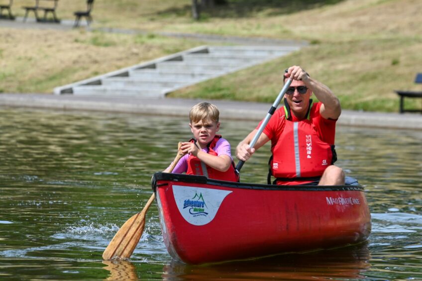 Andrew Clouston and son Josh, 6 had some fun in a canoe.