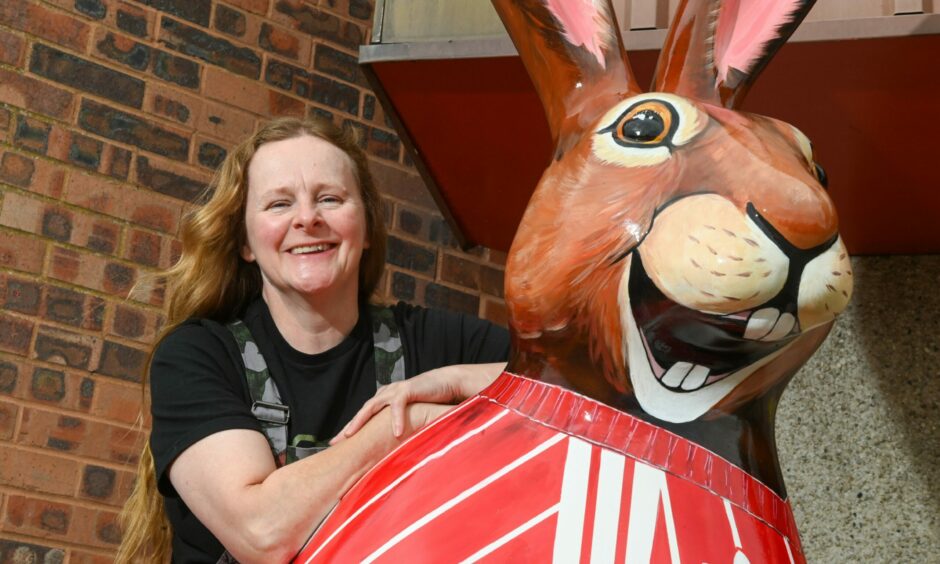 Lesley D McKenzie and her Big Hop Trail sculpture outside Pittodrie