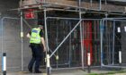 Police spotted at Aberdeen high rise Marischal Court. Image: Kenny Elrick/DC Thomson