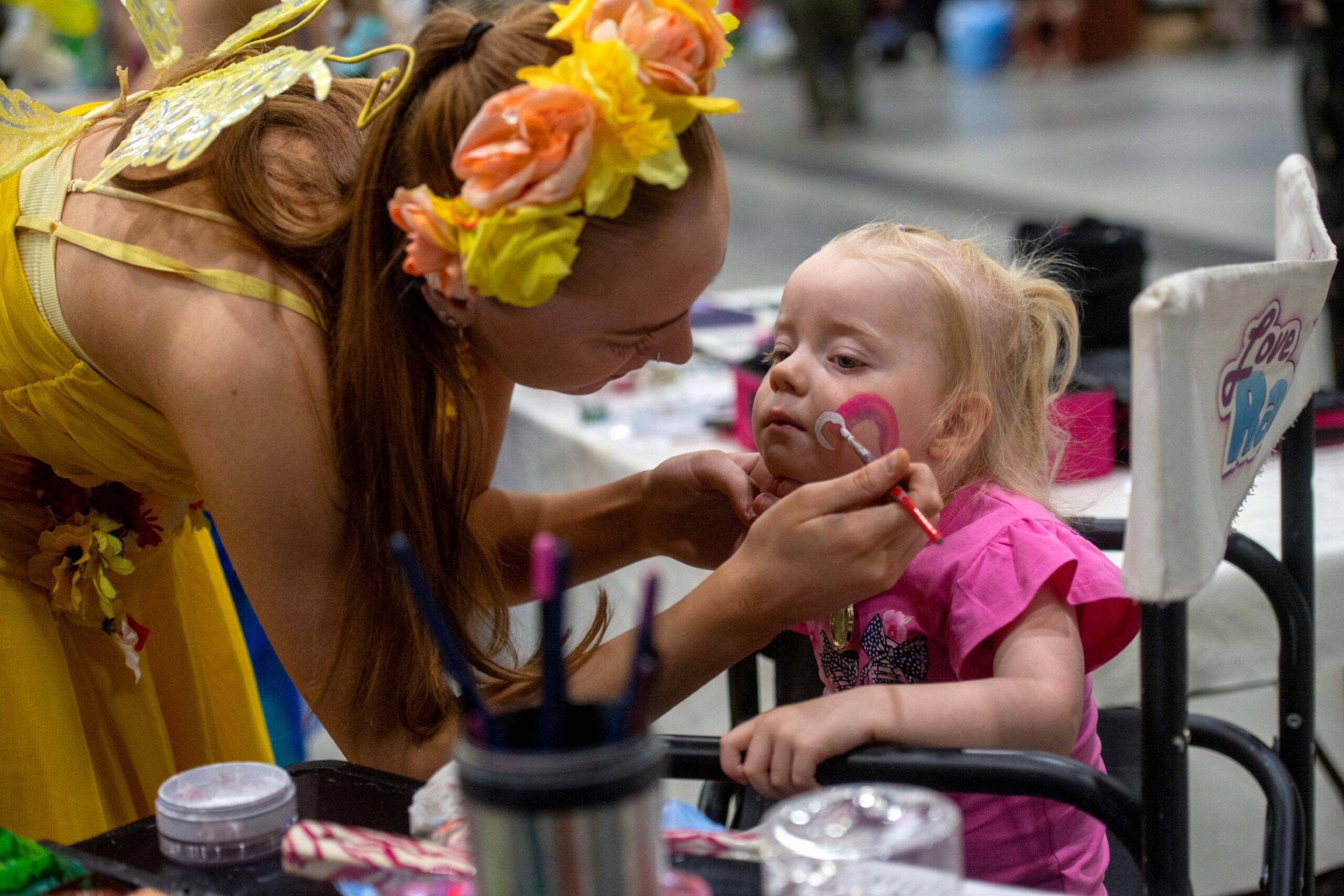 Young girl gets face painted at last year's TOG.