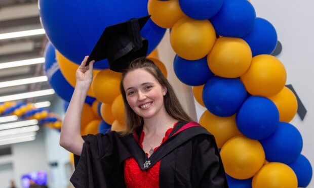 Happy Graduate Miriam McDonald.