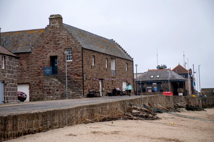 Outside the Tollbooth at Stonehaven Harbour.