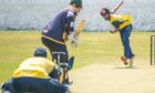 Abdulah Khalid bowling for Stoneywood-Dyce.  Image: Kami Thomson/DC Thomson