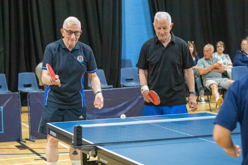 The Emmerdale's Daisy Campbell playing table tennis against Dave Curry and John Dewar. 