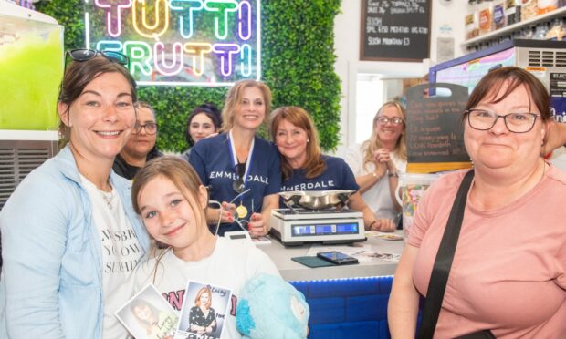 Tutti Frutti sweet shop with Emmerdale cast members Sam Giles and Susan Cookson and three generations of fans Sophie McIntosh, Lacey Buchan and Lorraine McIntosh.     
Image: Kami Thomson/DC Thomson