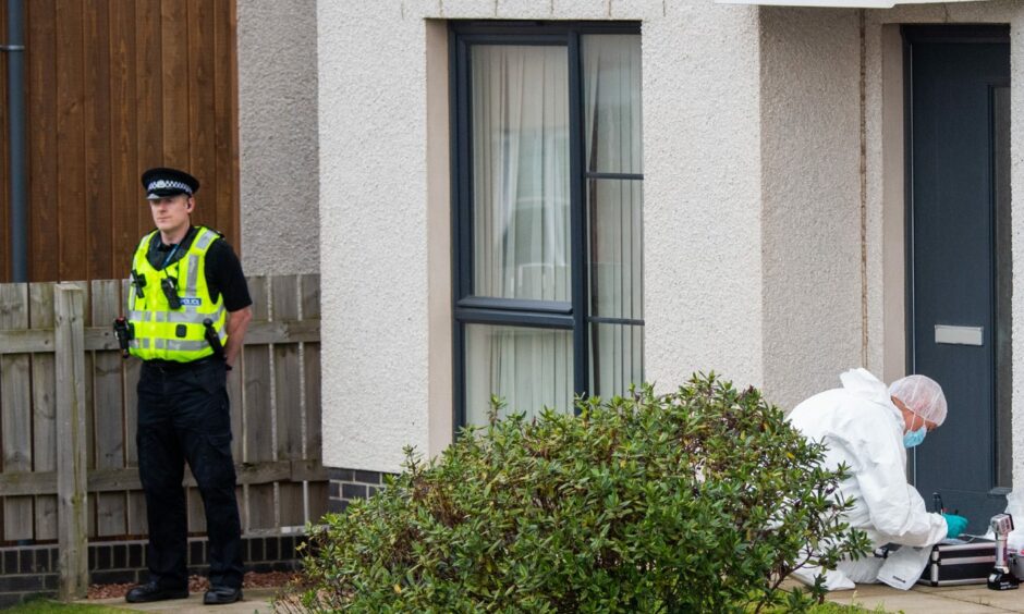 A police officer guarding the home in Cove while a forensics team work to investigate the alleged rape and attempted murder.