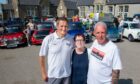 May Jappy with Brian Pirie and Gary MacDonald after the cars parked up in Cullen.
Images: Kami Thomson/DC Thomson