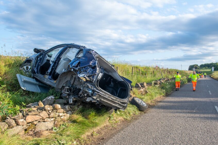 The crashed vehicle on Coast Road. 