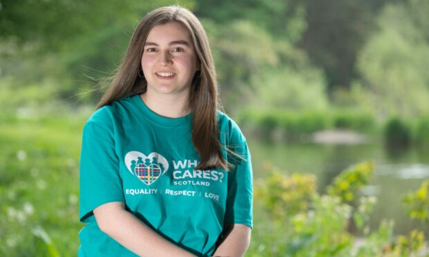 Inverurie teenager Katie Gibbs wearing a Who Cares? Scotland t-shirt