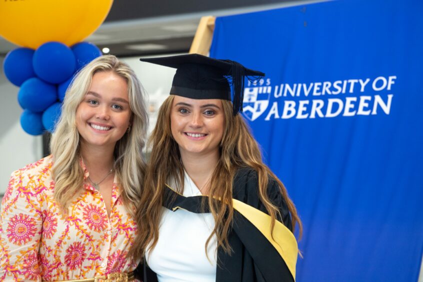Erin Reekie who graduated in Chemical Engineering, with her friend Morgan Adam. 