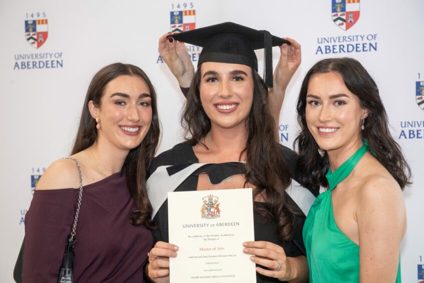 Student Niamh Stevenson with her sisters Clodagh and Roisin.