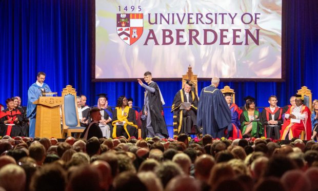 Students on stage at P&J Live for Aberdeen University graduation
