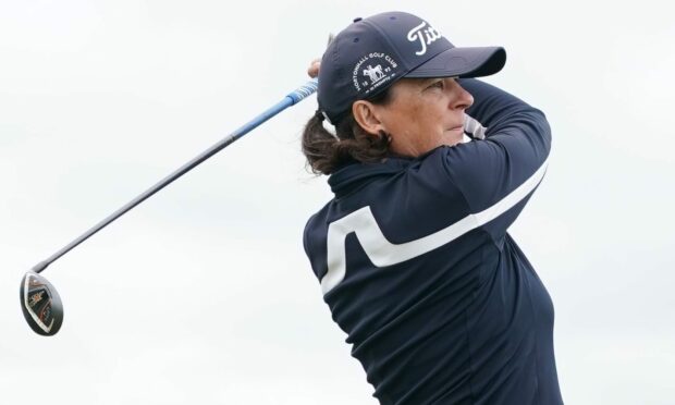 Scottish Senior Women's Open Championship reigning champion Karen Fergusson-Sneddon watches on after hitting a shot.