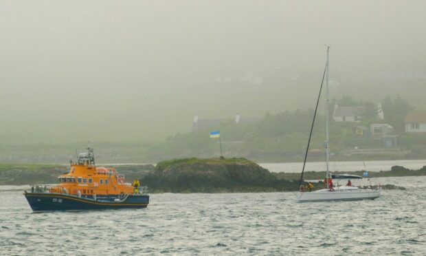 Lerwick lifeboat towing the Norwegian yacht