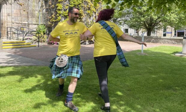 Befriend a Child senior fundraising co-ordinator Claire Bain and her husband Euan Bain get into the ceilidh spirit. Image: Befriend a Child.