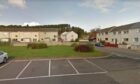 Sean Paterson was found on the grass outside Lossie Cottages in Elgin. Image: Google Street View
