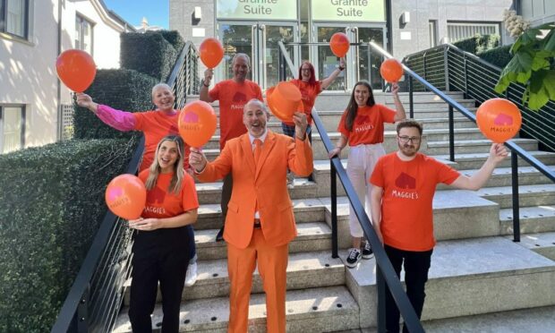 The Maggie's Team, all dressed in orange for Aberdeen Maggie's. Ball Committee members, back from left: Ruth Stewart, Jim Grimmer, Kirsten Reid and Jadine Douglas. Front, from left: Centre Fundraising Organiser Rebecca Stewart, Centre Fundraising Manager Richard Stewart and Centre Fundraiser Ryan Wilson. Image: MAggie's. Picture shows; Ball Committee members, from left: Ruth Stewart, Jim Grimmer, Kirsten Reid and Jadine Douglas. Front, from left: Centre Fundraising Organiser Rebecca Stewart, Centre Fundraising Manager Richard Stewart and Centre Fundraiser Ryan Wilson.