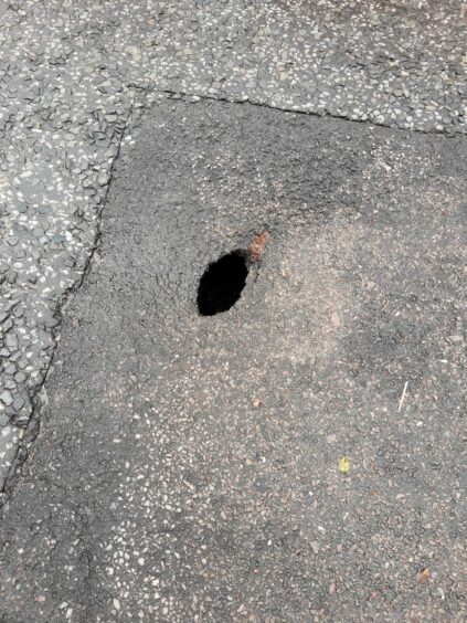 Close up of the sinkhole in Aberdeen city centre.