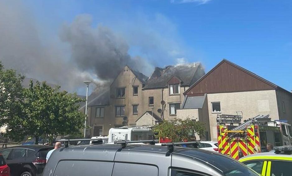 Dark grey smoke coming from the Harbour Street building during the peak of the incident. 