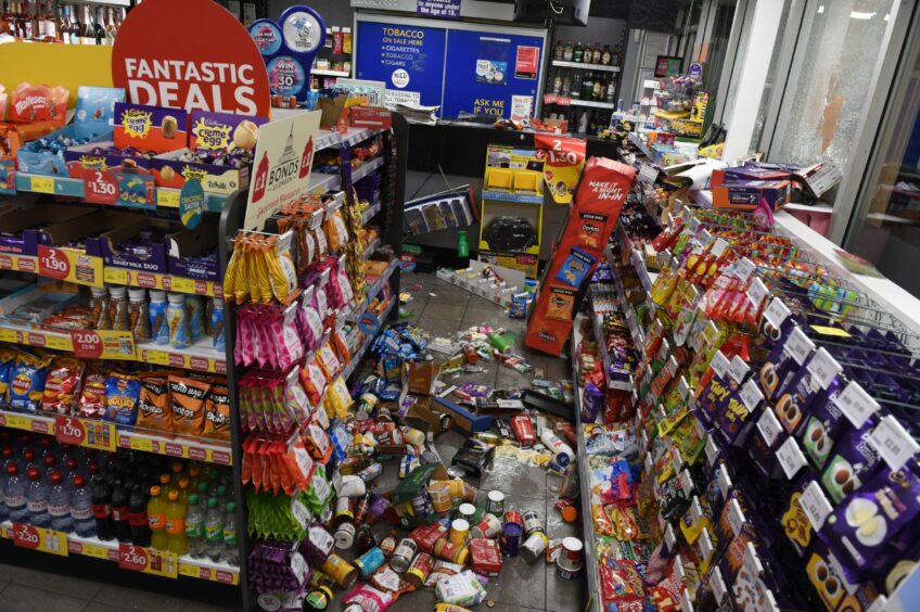 Products strewn across floors and shelving destroyed in Derek Ellington's rampage at the BP garage in Dyce. 