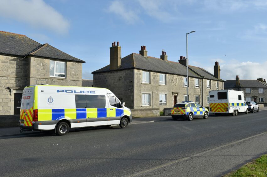 Three police vehicles parked on Watermill Road in Fraserburgh 