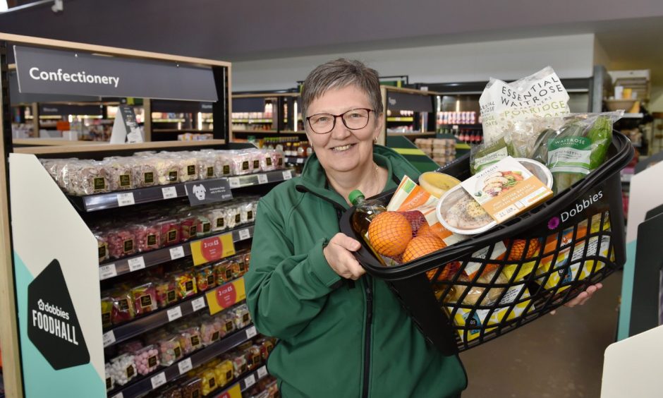 Operations Manager Yvonne Bernard in the Aberdeen Waitrose food hall with products when it opened in 2023. Image: Darrell Benns/DC Thomson