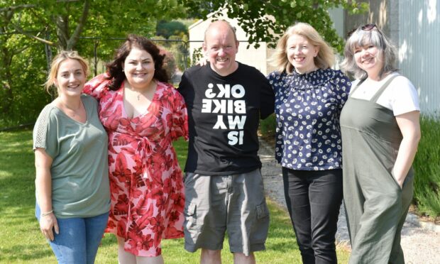 Kev, centre, says thank you to his four nurse saviours - from left, Zoe Meldrum, Menna Forgrieve, Donna Duncan and Megan McLeod. Image: Darrell Benns/DC Thomson