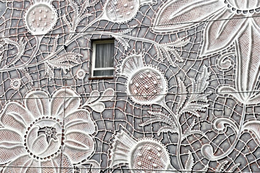 Close up of the detailed artwork by NESPOON featuring monochromatic flowers.