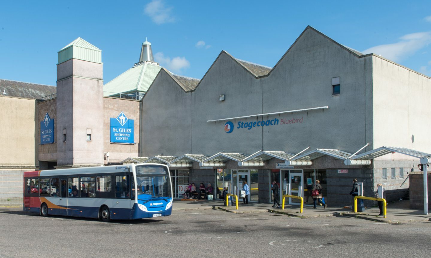 Stagecoach bus pulling away from Elgin bus station. 