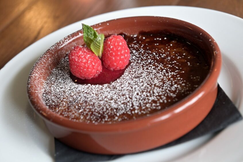 Chocolate creme brulee with raspberry coulis at The Loch Ness Inn.