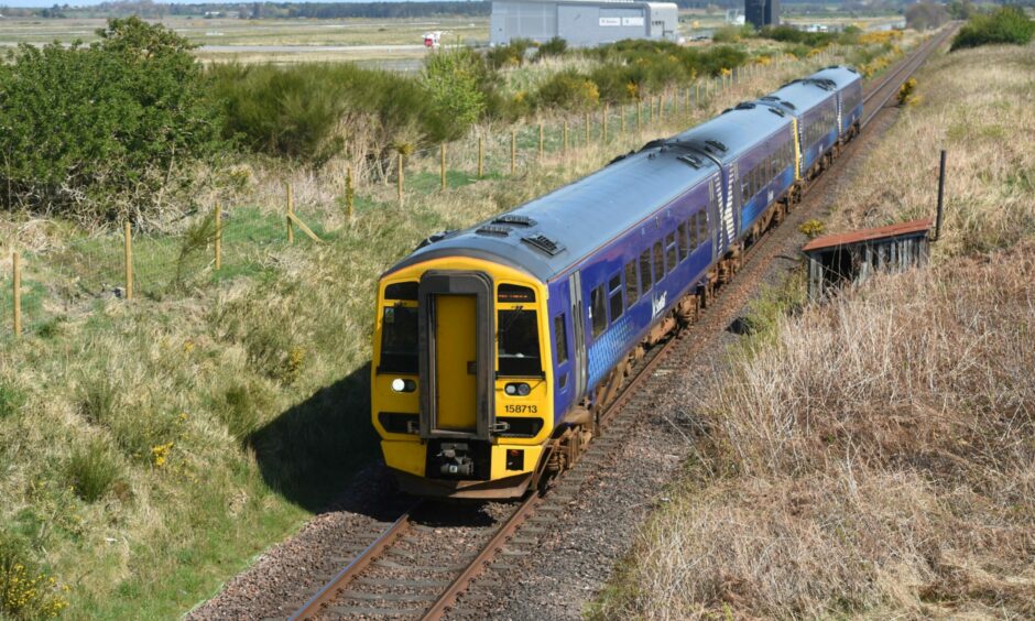 A ScotRail train on the Inverness to Aberdeen line.