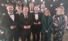A photo of Left to right: Impact reporter Brendan Duggan, live team reporter Louise Glen, investigations reporter Dale Haslam, city reporter Alastair Gossip, editor of The Press and Journal Craig Walker, North journalist Stuart Findlay, sports reporter Sophie Goodwin and features writer Ellie House at the 44th Scottish Press Awards.