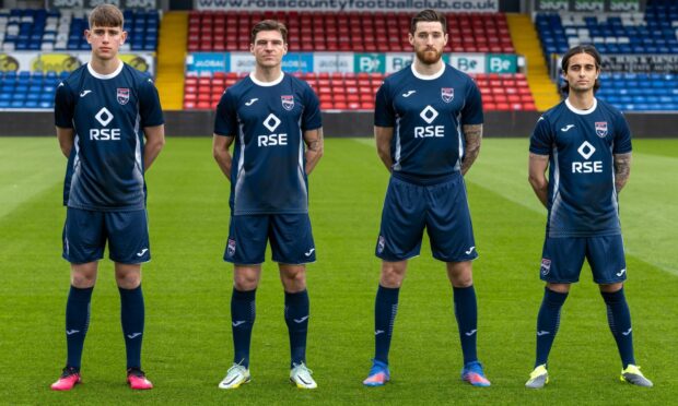 Dylan Smith, Ross Callachan, Jack Baldwin and Yan Dhanda model Ross County's new home kit for the 2023-24 season. Image: Ross County FC