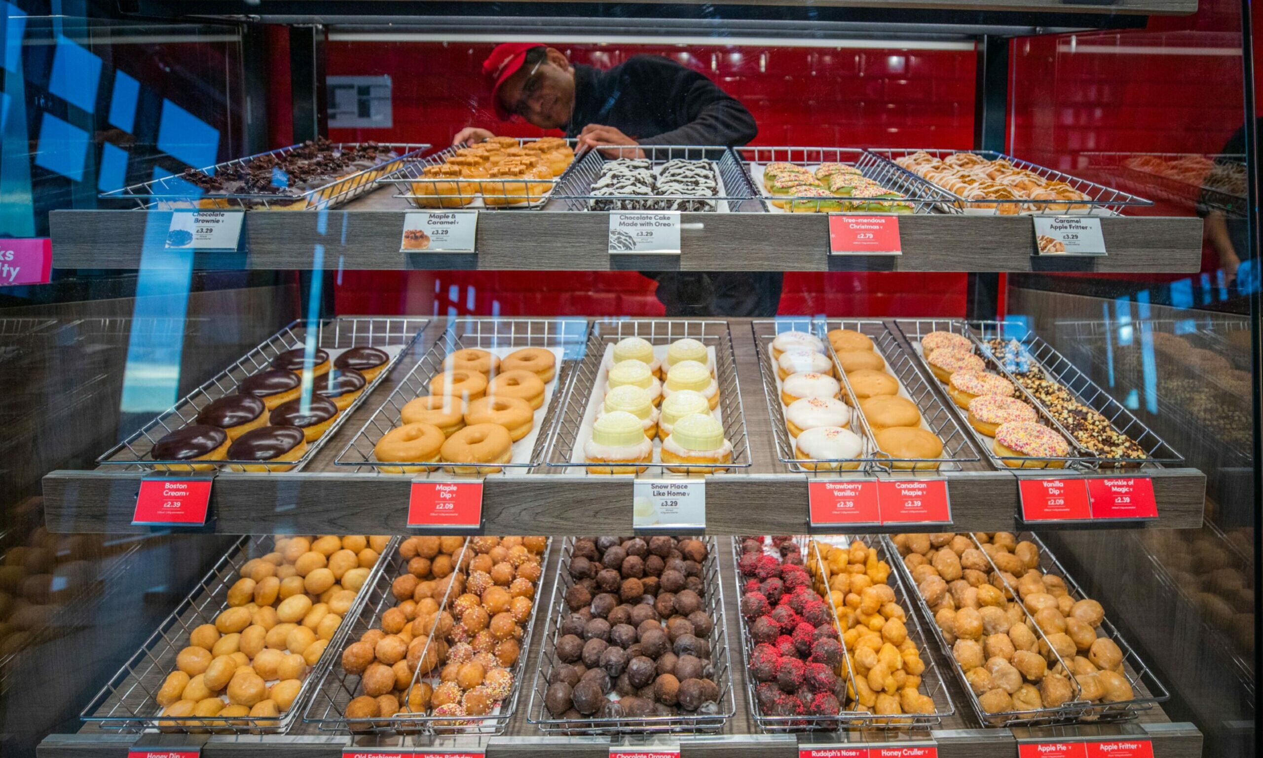 Varieties of doughnut include maple and caramel, Boston cream, apple and cherry, and chocolate bownie. 