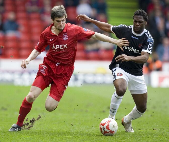 Michael Hart in the Dons' 2006/07 collared strip.