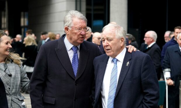 Sir Alex Ferguson (left) and Craig Brown at the unveiling of a Denis Law statue in Marischal Square, Aberdeen in November 2021. Image: PA