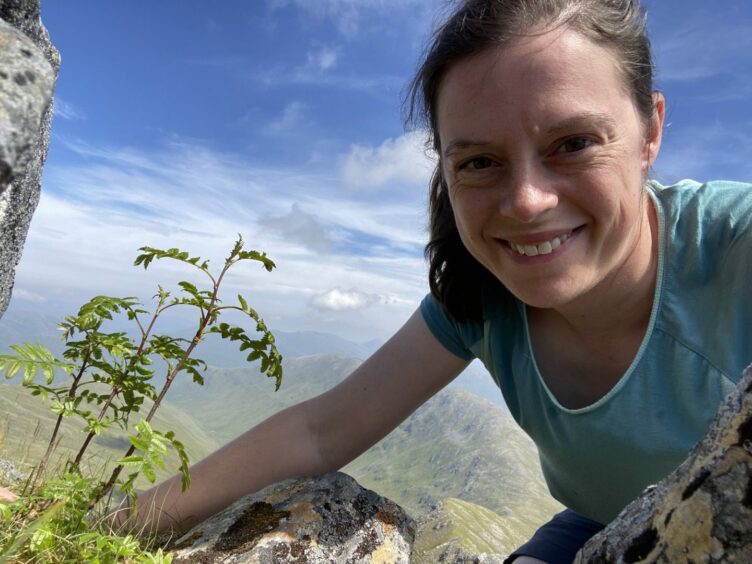 Sarah Watts with Rowan at 1150m on Sgurr nan Ceathreamhnan. 